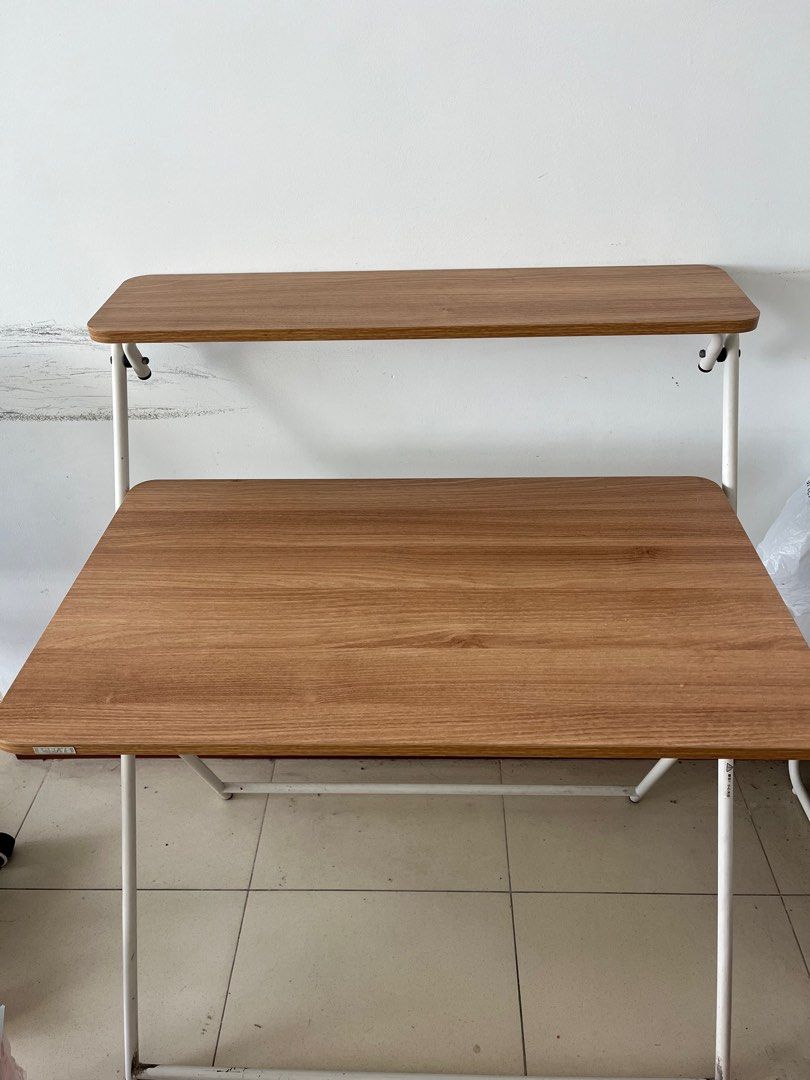 Study table (Category: Tables & Sets) located in Singapore. Submitted by yguo1997 (Listing ID 1302399995, Image 1). Description: This is a double-layer study table that can also be used as a dining table, folding, wood color, very strong and durable. Hope you can pick up or order the delivery on your side :) Can negotiate..