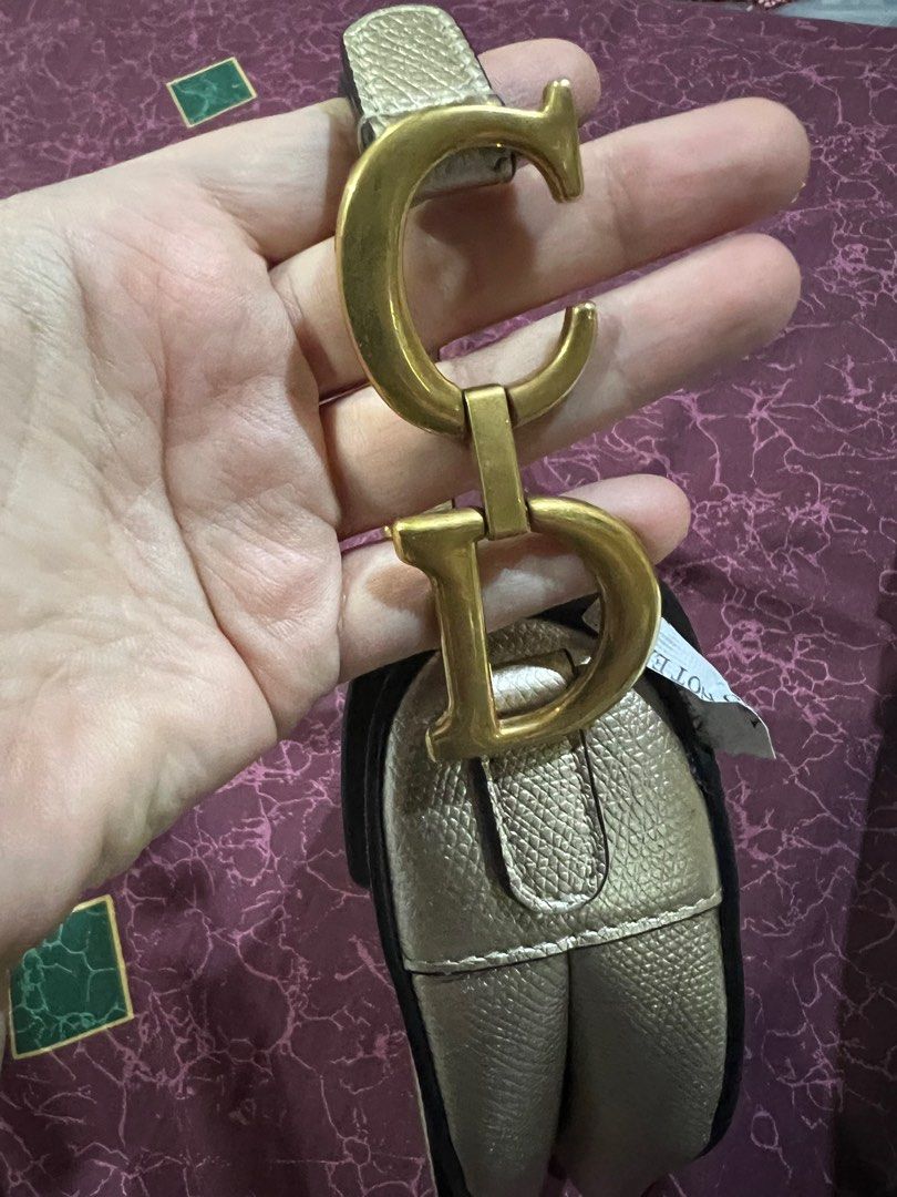 Dior Mini Saddle (Category: Luxury Bags & Wallets) located in Manila. Submitted by bibtn (Listing ID 1306347510, Image 2). Description: Dior Mini Saddle in Gold Calfskin and Gold Hardware -with Entrupy -with Box -with provided dustbag -with provided strap .