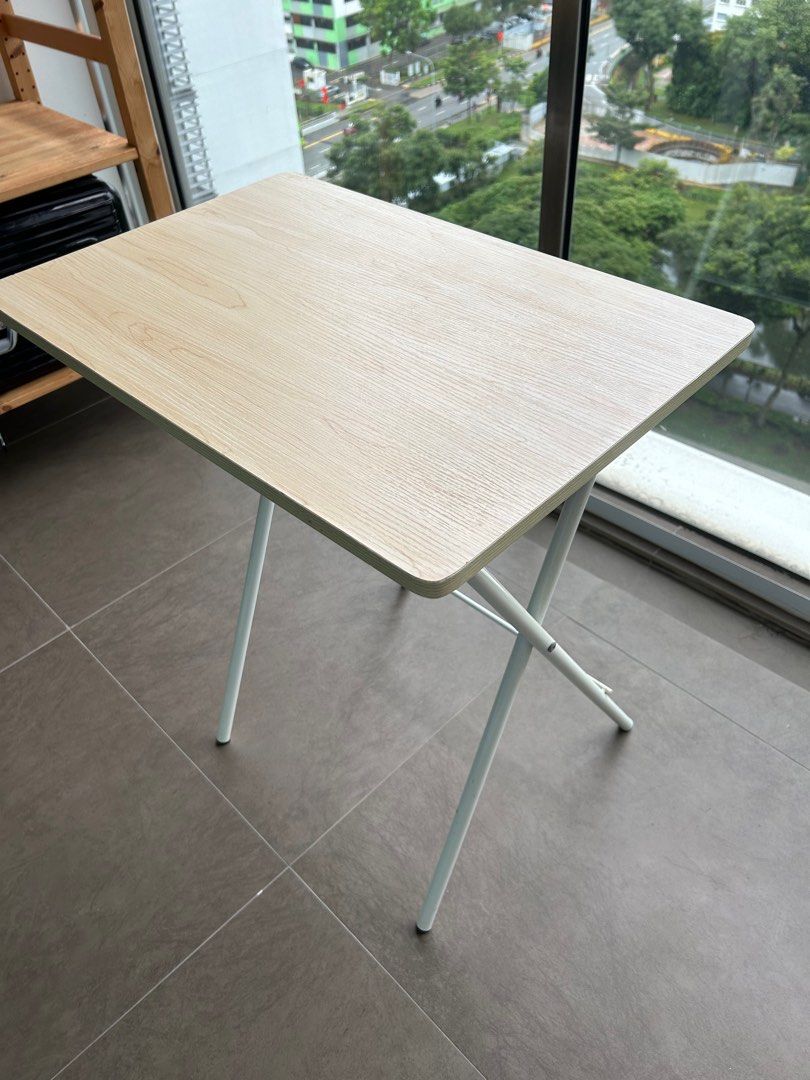 Foldable Table (Category: Tables & Sets) located in Singapore. Submitted by timtimethames (Listing ID 1306380817, Image 1). Description: Foldable table. Size 60 x 40 x 70. .