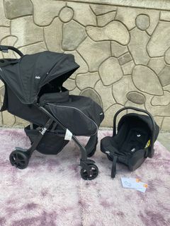 Joie Muze Lx Stroller with carseat and footmuff