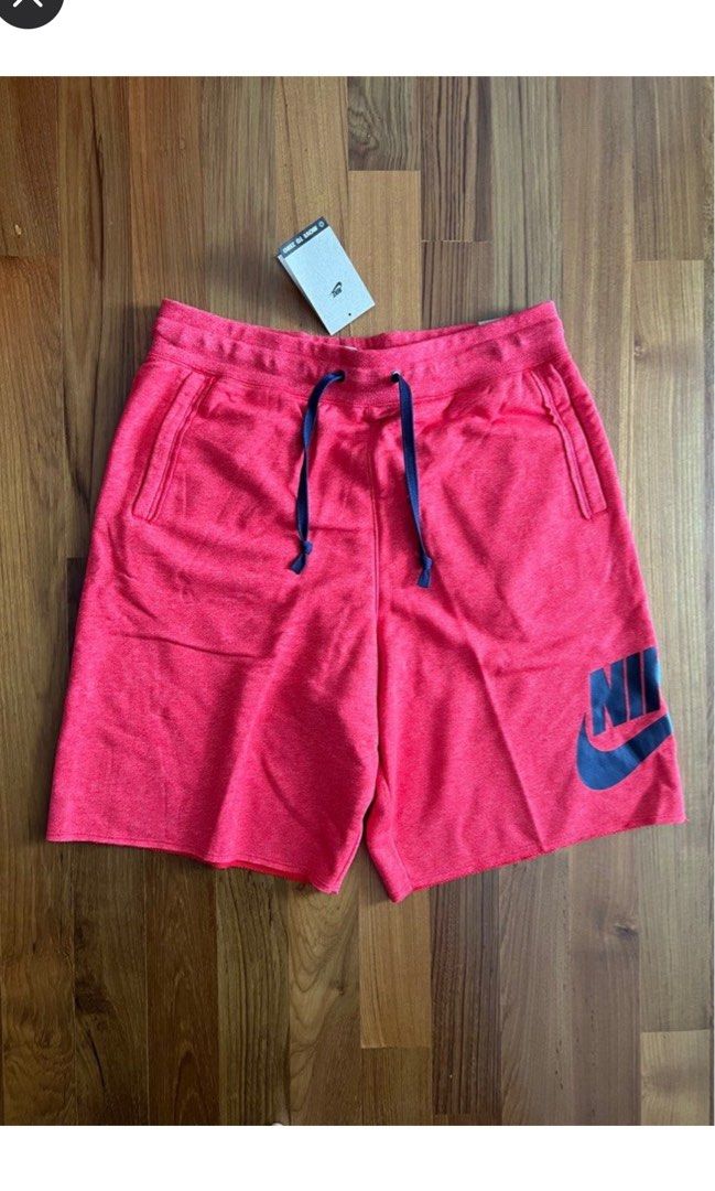 NIKE Men s Loose Fit Knee Length Shorts in University Red Size L