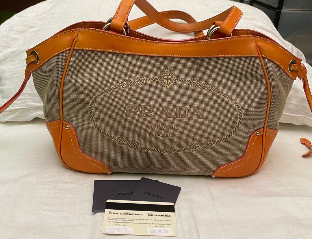 Original Prada Canvas Shoulder Bag (Category: Luxury Bags & Wallets) located in Quezon City. Submitted by cglui_152 (Listing ID 1306507463, Image 1). Description: Please take note that seller will not respond to low ballers; the price reflects the condition of the bag. Guaranteed original, refer to the photos for the actual condition of the bag and expect some imperfection or noticeable signs of usage. .