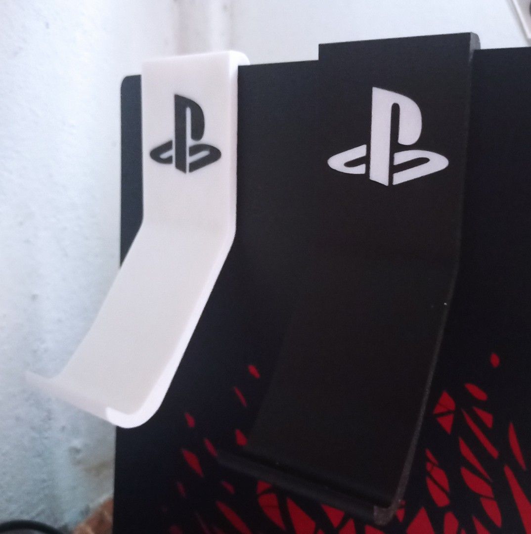 Ps5 controller holder (Category: Controllers) located in Kota Bharu. Submitted by mr.sekut (Listing ID 1306426424, Image 1). Description: 3d printed ps5 controller holder using PLA. Can request for other colours..