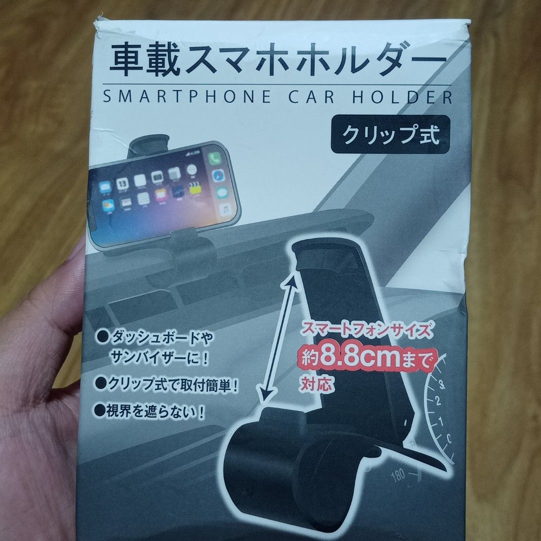 SMARTPHONE CAR HOLDER (Category: Mounts & Holders) located in Makati City. Submitted by nyxhemera26 (Listing ID 1306517050, Image 1). Description: SMARTPHONE CAR HOLDER • NEW BUT TORN BOX.