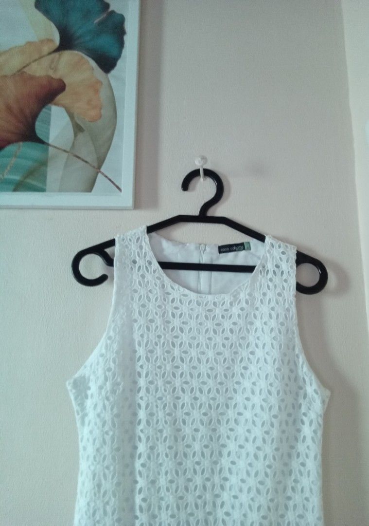 Stylish Coco Cabana White Eyelet Dress (Category: Dresses) located in Quezon City. Submitted by anlimorevoni (Listing ID 1306360030, Image 2). Description: Stylish Coco Cabana White Eyelet Dress, fully-lined, sleeveless, best fits XS and Petite body frames, although label is S size, made in Thailand. A dress that combines style and sophistication. Ideal wear for graduation, semi-formal dates/parties, and civil wedding. Dress is in tiptop conditio