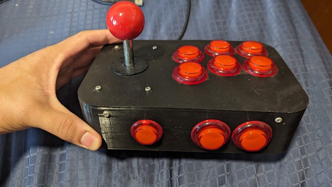 USB Arcade Console controller (Category: Controllers) located in Singapore. Submitted by twelve_trees (Listing ID 1306390274, Image 2). Description: 3D Printed USB Arcade Controller, 15 for 1, 25 for both! very fun to use with emulator when you're playing arcade games like MVC2, street fighter etc. DIY assembled because I used to be into making and 3d printing things. letting go to clear space and let someone else enjoy this..