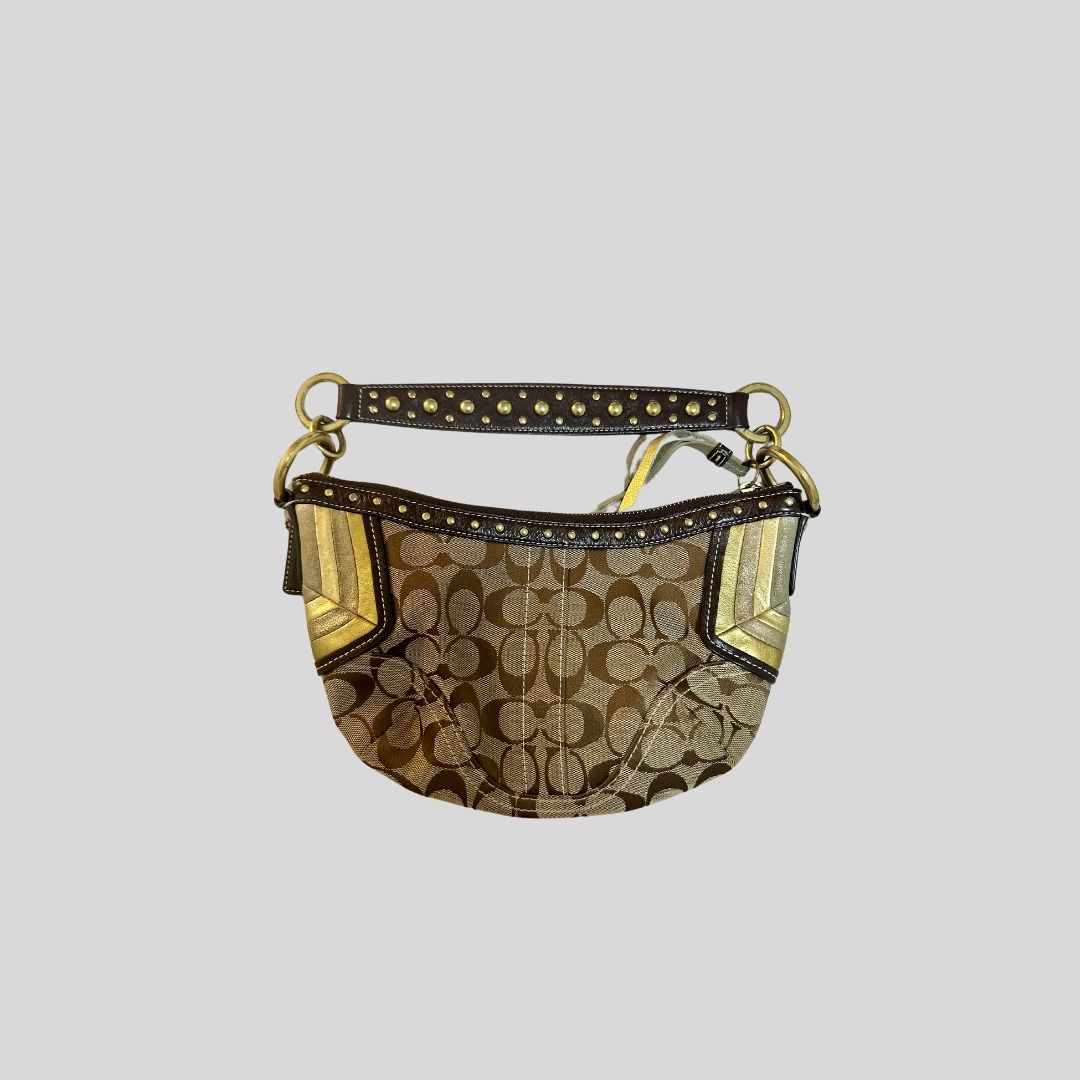 Coach vintage Pochette/Baguette (Category: Luxury Bags & Wallets) located in Quezon City. Submitted by reiclosett (Listing ID 1308072853, Image 3). Description: Used with care. Flaws, if any, are barely noticeable..