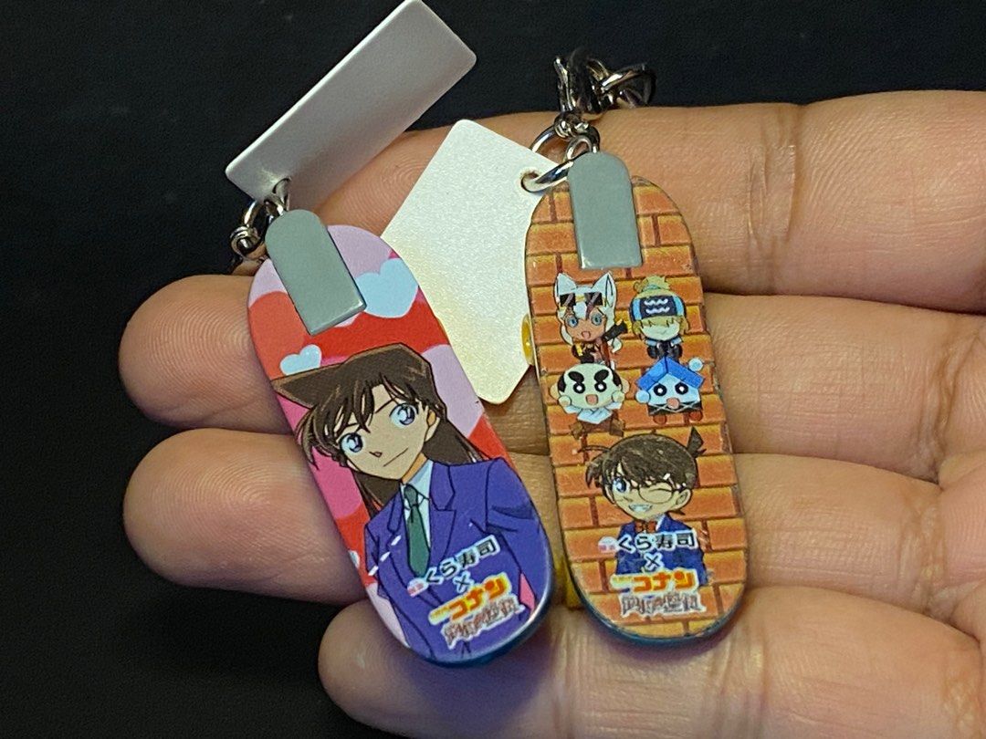 Detective Conan merch keychains and pin set (Category: Character Goods) located in Agoo. Submitted by collect12 (Listing ID 1307986649, Image 2). Description: Detective Conan merch keychains and pin set.