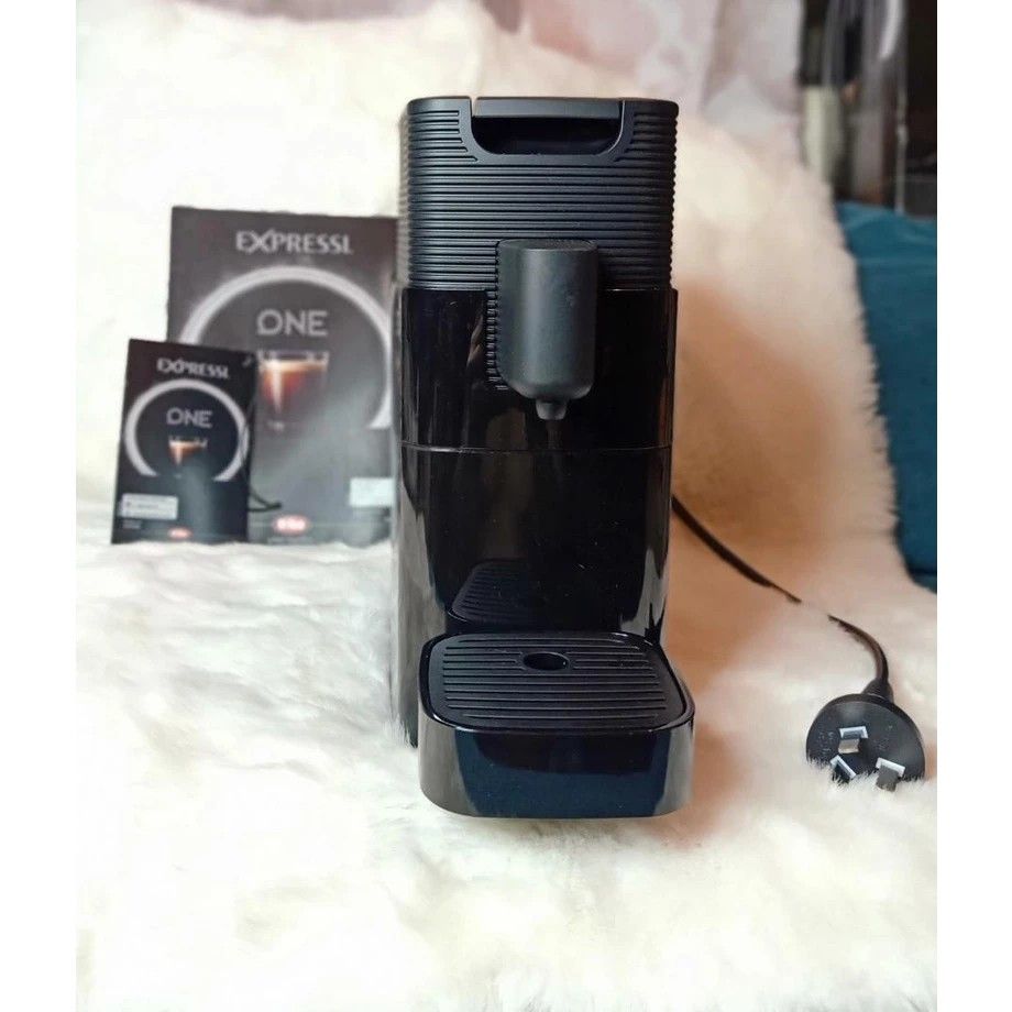 Expressi (coffee maker pods) (Category: Coffee Machines & Makers) located in Quezon City. Submitted by glezylda29.95 (Listing ID 1307991163, Image 3). Description: Expressi Multi-Beverage/Coffee Capsule Machine One K-fee ONE is considered by many to be an exquisite entrance into the world of barista-quality cafe drinks at home. Featuring the unique Duo Pressure technology, the ONE can create a delicious crema using your favorite K-fee compatible 
