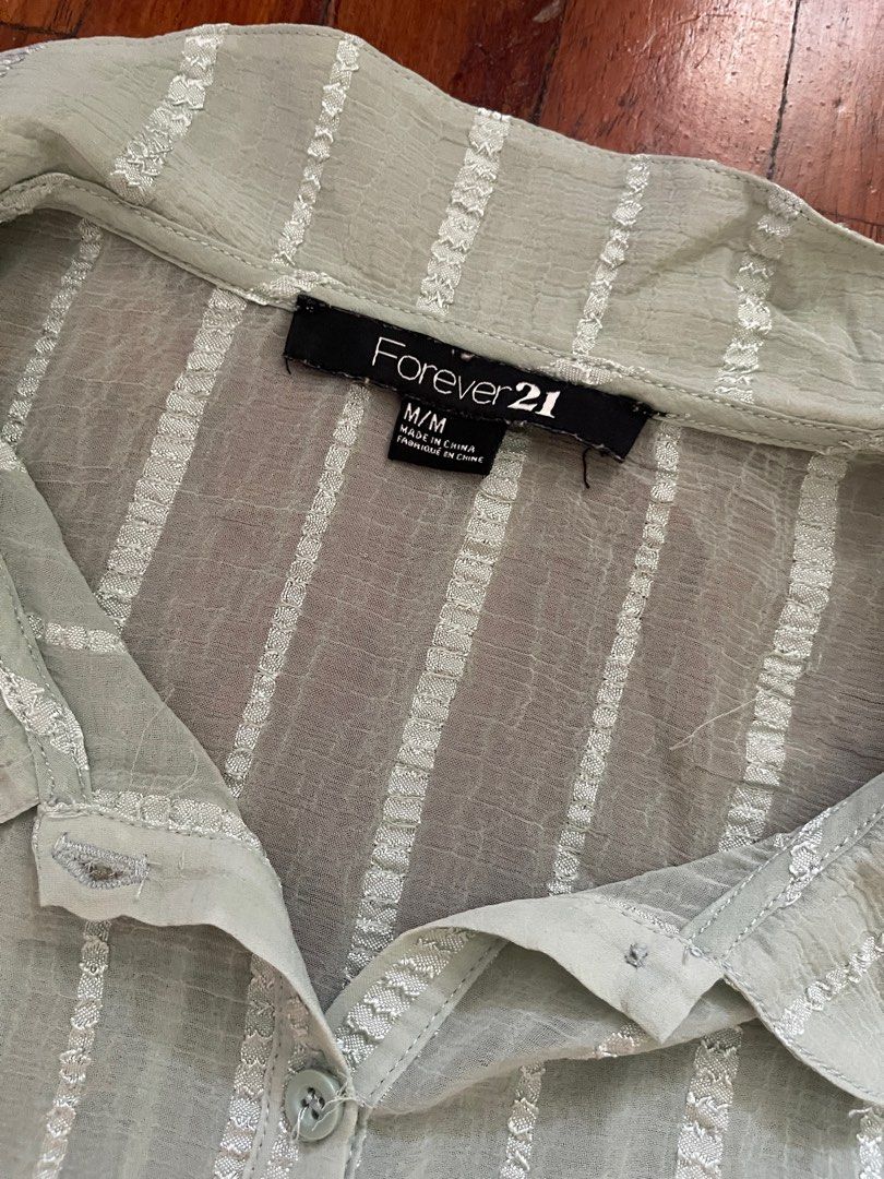 F21 Top (Category: Blouses) located in Paranaque City. Submitted by stphraynes (Listing ID 1307970984, Image 2). Description: F21 see through top! - Preloved - Size: Medium.