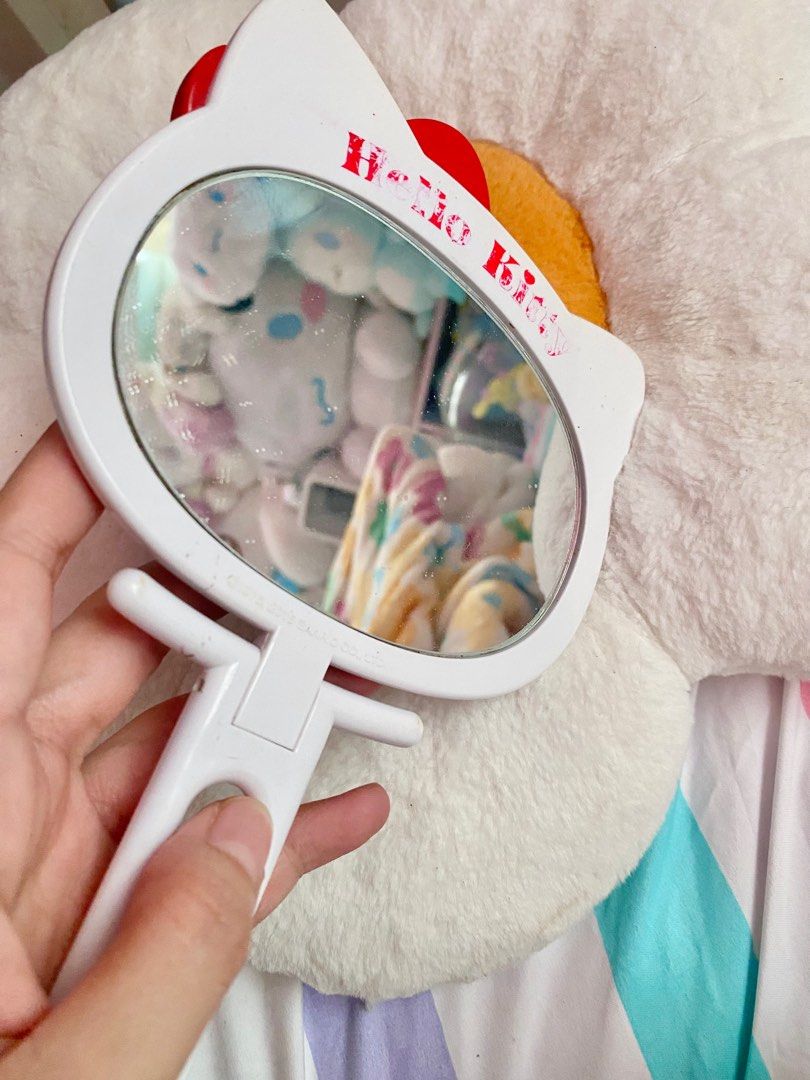 Hello Kitty Handheld Mirror (Category: Mirrors) located in Mabalacat. Submitted by strawbearytelle (Listing ID 1307970467, Image 2). Description: has discoloration and minor flaws but no cracks. .
