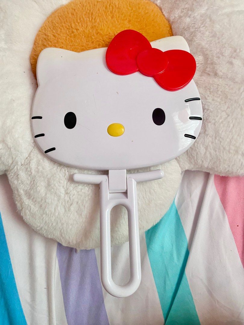 Hello Kitty Handheld Mirror (Category: Mirrors) located in Mabalacat. Submitted by strawbearytelle (Listing ID 1307970467, Image 1). Description: has discoloration and minor flaws but no cracks. .