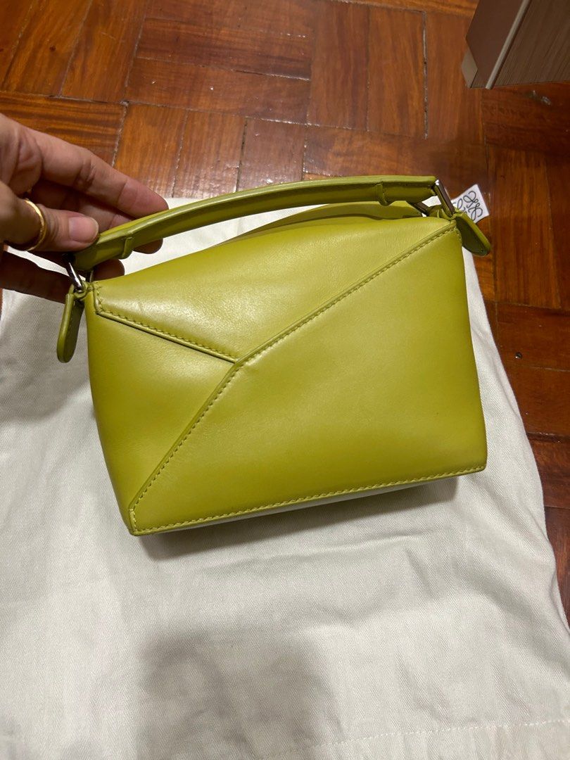 Loewe mini puzzle (Category: Luxury Bags & Wallets) located in Quezon City. Submitted by lalaandkiki (Listing ID 1308058267, Image 2). Description: With tag, paper bag, box dustbag care cards Bought from Shang .
