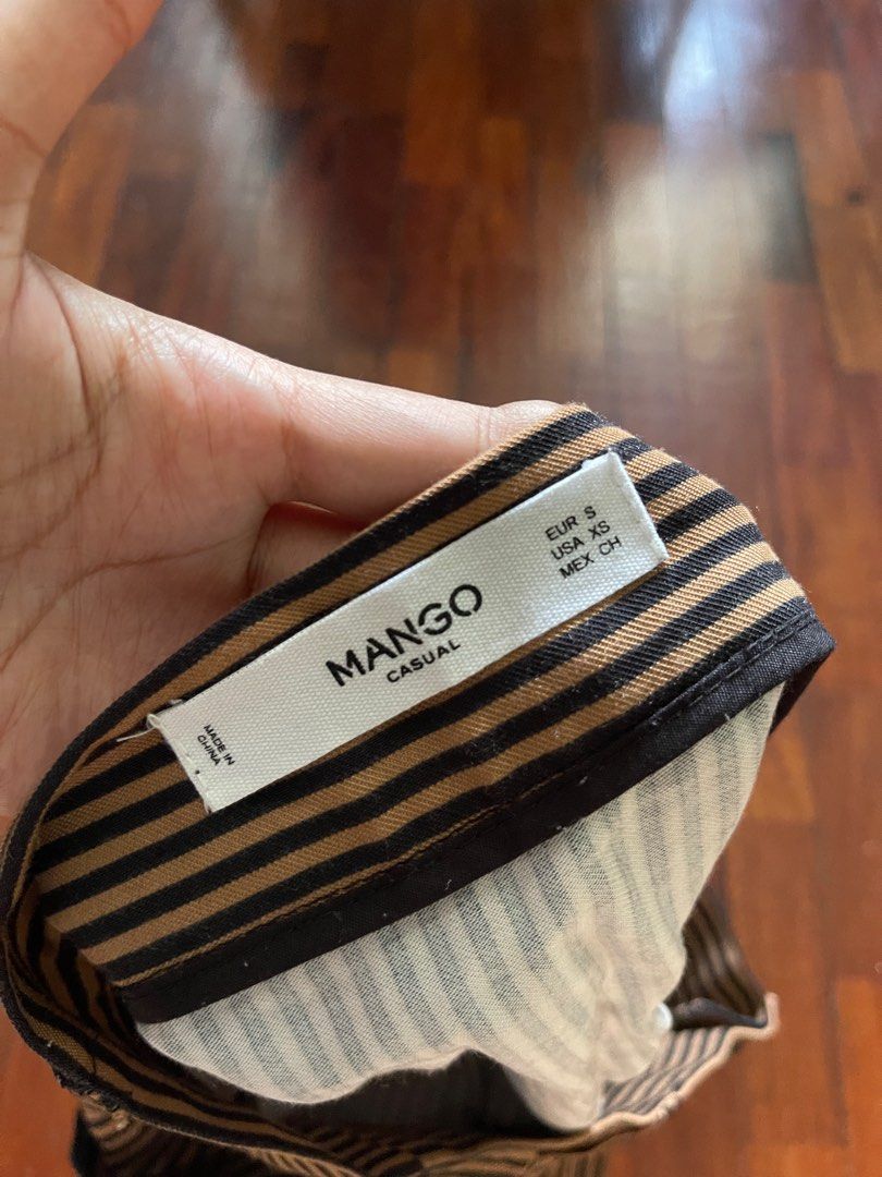 Mango Skirt (Category: Skirts) located in Paranaque City. Submitted by stphraynes (Listing ID 1307972247, Image 3). Description: Mango Brown/Black Stripe Skirt - Preloved - Size: Small.