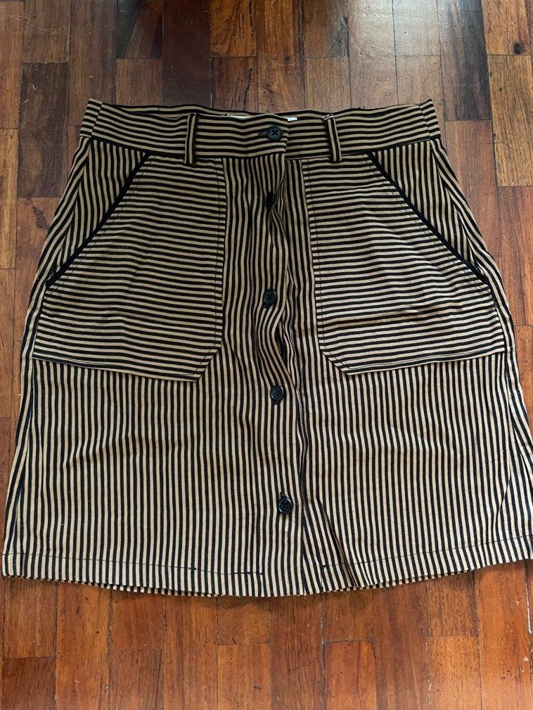 Mango Skirt (Category: Skirts) located in Paranaque City. Submitted by stphraynes (Listing ID 1307972247, Image 1). Description: Mango Brown/Black Stripe Skirt - Preloved - Size: Small.