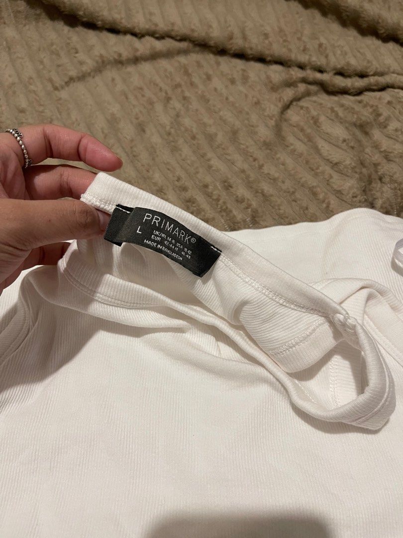Primark Tank top (Category: Sleeveless) located in Pasig City. Submitted by basicallyb (Listing ID 1307953473, Image 2). Description: can fit L-Xl rfs: maluwag for me never used.