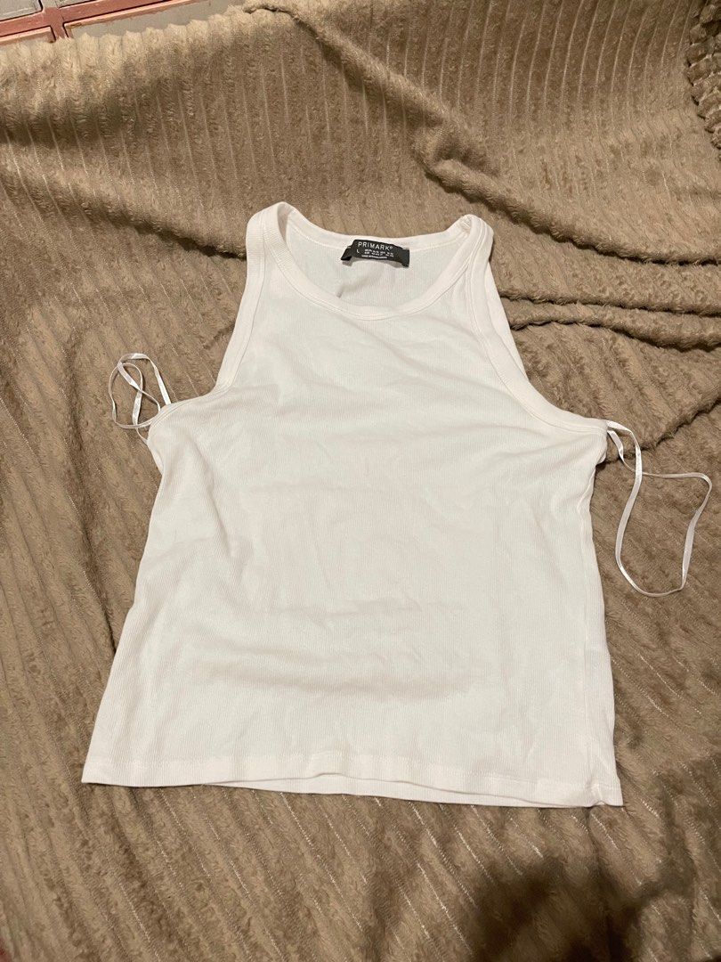 Primark Tank top (Category: Sleeveless) located in Pasig City. Submitted by basicallyb (Listing ID 1307953473, Image 1). Description: can fit L-Xl rfs: maluwag for me never used.