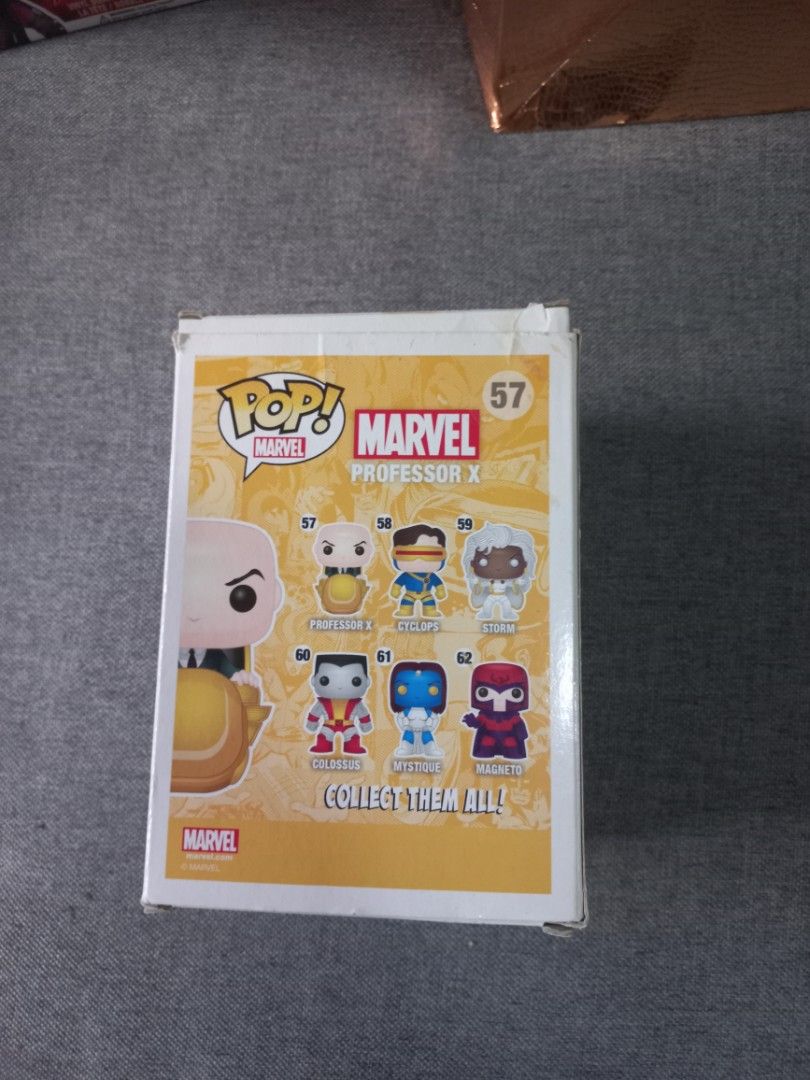 Professor X (57) Funko Pop Bobble Head (Category: Designer & Blind Box Toys) located in Pasay City. Submitted by movingout_lowprices (Listing ID 1308023424, Image 3). Description: box is worn, was opened and displayed. hot chocolate spilled on box, sorry.