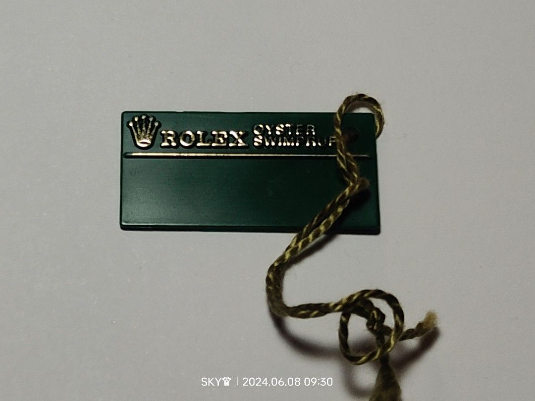Rolex W serial swimpruf tag for box set (Category: Luxury Watches) located in Quezon City. Submitted by sky_sale (Listing ID 1307962840, Image 2). Description: rolex W serial swimpruf tag year 1995 also available rolex box booklet manual tags link bezel leather card holder wallet tag translation calendar case plastic submariner Datejust Daytona explorer gmt.
