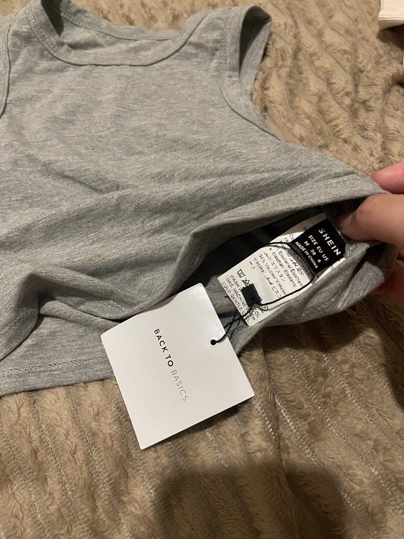 Shein tank top (Category: Sleeveless) located in Pasig City. Submitted by basicallyb (Listing ID 1307953934, Image 2). Description: bnew cut tag i lost the tag doesnt fit me M on tag but can fit XS-S.