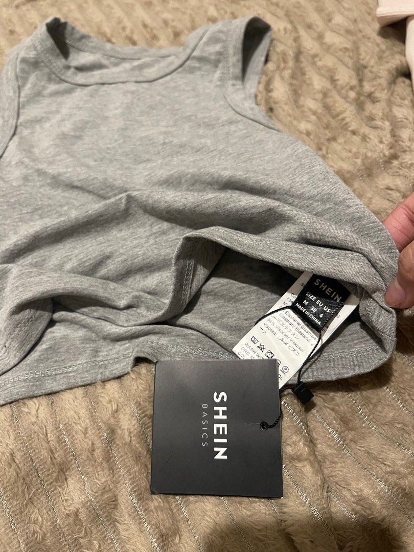 Shein tank top (Category: Sleeveless) located in Pasig City. Submitted by basicallyb (Listing ID 1307953934, Image 3). Description: bnew cut tag i lost the tag doesnt fit me M on tag but can fit XS-S.