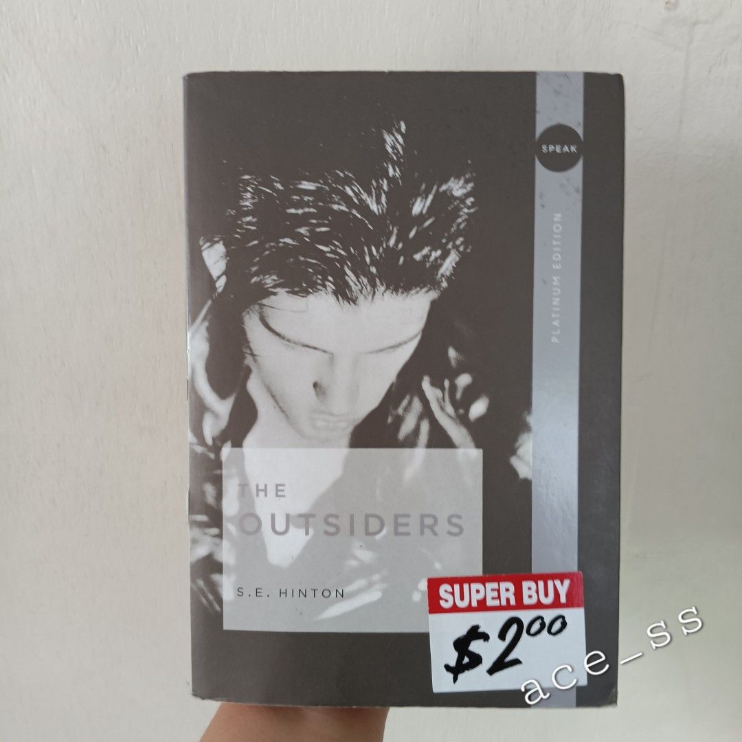 The Outsiders by S.E. Hinton (Category: Storybooks) located in Cavite. Submitted by ace_ss (Listing ID 1307963644, Image 1). Description: The Outsiders is about two weeks in the life of a 14-year-old boy. The novel tells the story of Ponyboy Curtis and his struggles with right and wrong in a society in which he believes that he is an outsider. According to Ponyboy, there are two kinds of people in the world: greasers and socs. A soc (short for "s