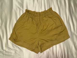 UNIQLO yellow shorts in medium