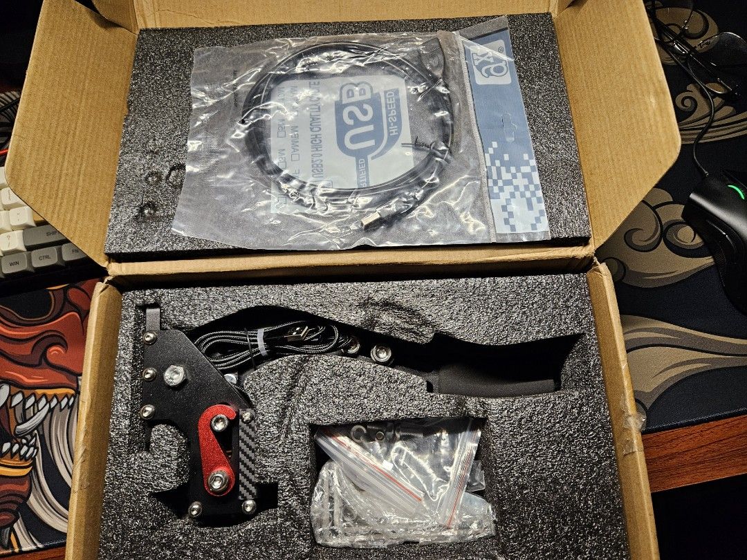USB Handbrake for PC Simulation Driving Games (Category: Controllers) located in Quezon City. Submitted by FitNHobbies (Listing ID 1308093855, Image 1). Description: USB HANDBRAKE (PC ONLY) Price: 3500PHP Location: Parañaque City Mode of Payment: GCASH and CASH Mode of Delivery: Lalamove (Buyers Expense) High-Quality Material Crafted from aluminum and stainless steel, this handbrake guarantees durability and long-lasting performance for your raci