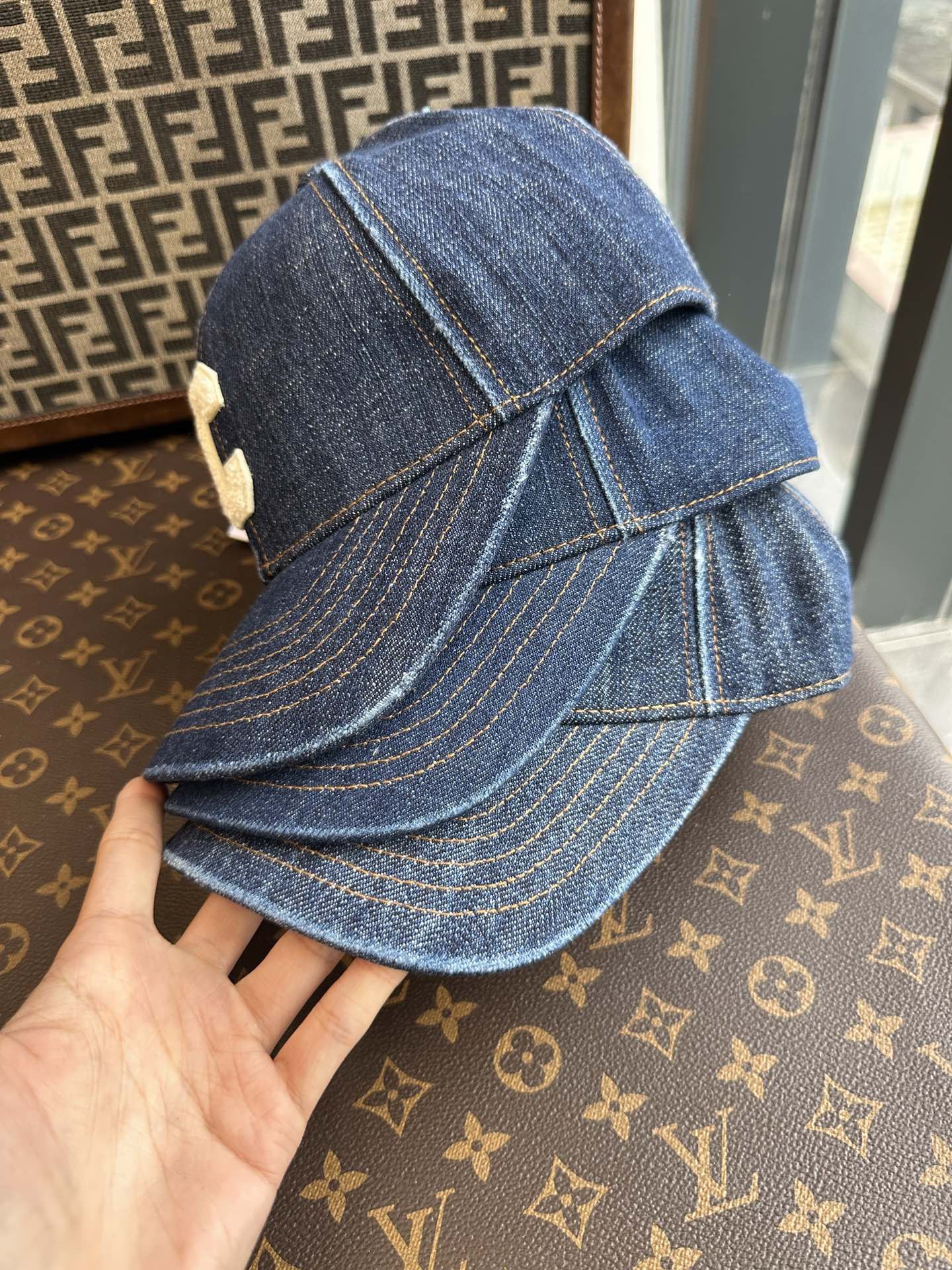 Authentic celine washed blue cap, Luxury, Accessories on Carousell