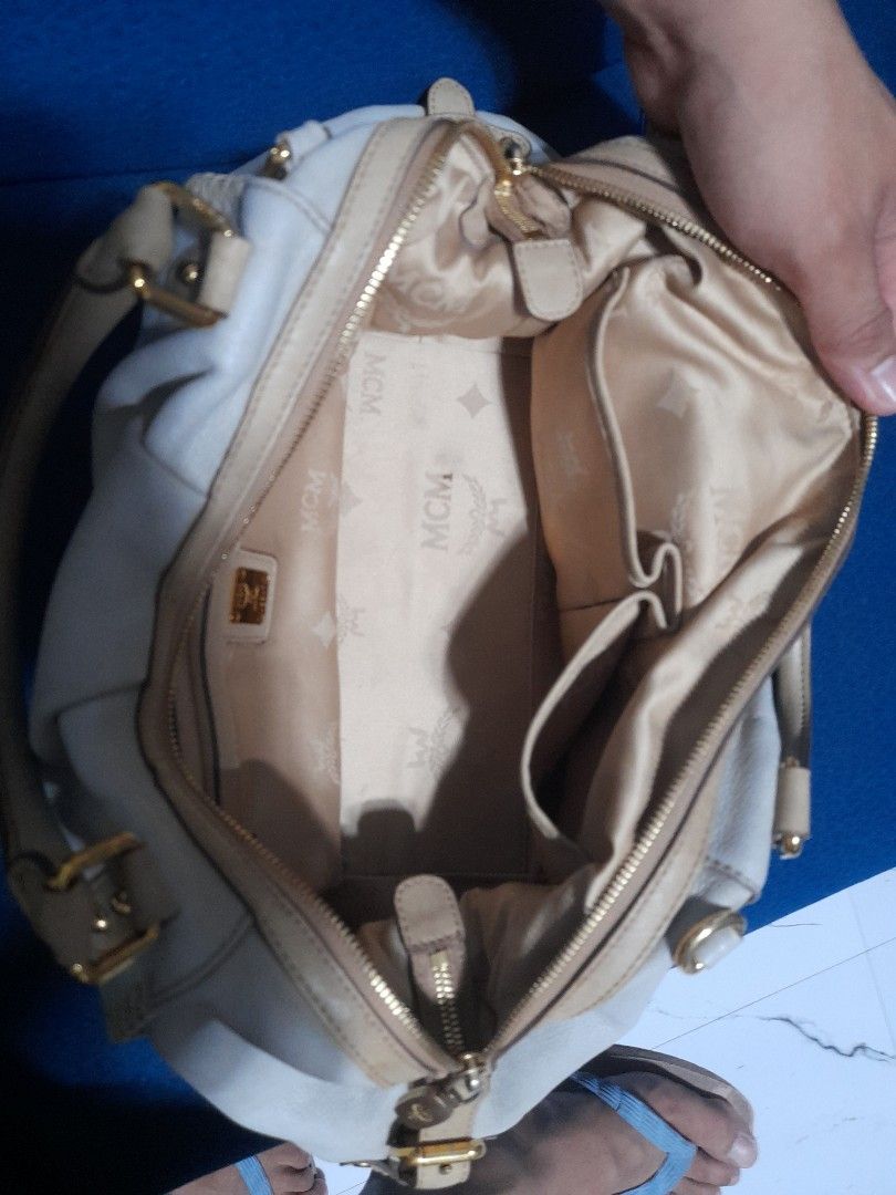 Authentic MCM bag (Category: Luxury Bags & Wallets) located in Manila. Submitted by alamarween (Listing ID 1308272879, Image 3). Description: authentic MCM bag without shoulder strap and minor flaws (see pictures). shipping fee will be shouldered by the buyer. thank you 😊.