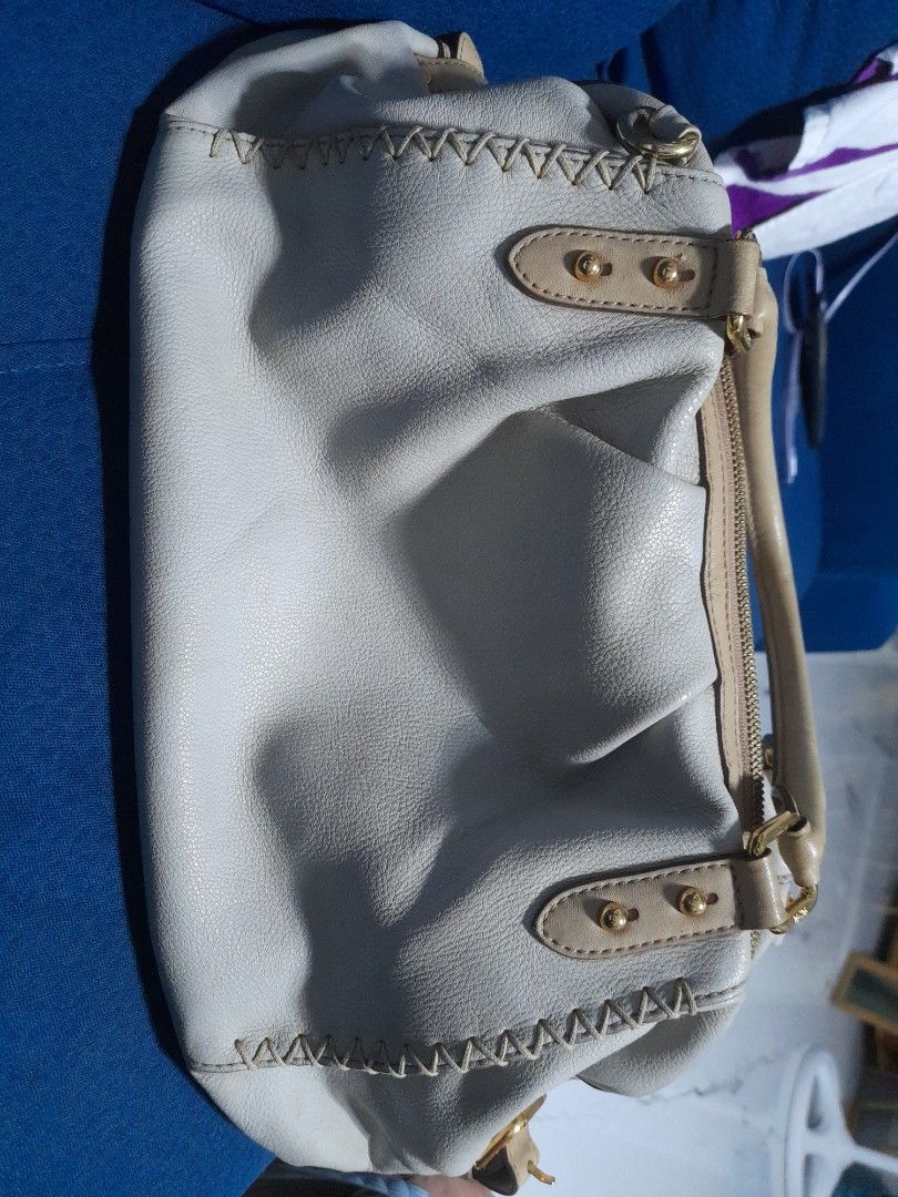 Authentic MCM bag (Category: Luxury Bags & Wallets) located in Manila. Submitted by alamarween (Listing ID 1308272879, Image 2). Description: authentic MCM bag without shoulder strap and minor flaws (see pictures). shipping fee will be shouldered by the buyer. thank you 😊.