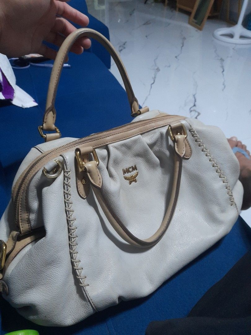 Authentic MCM bag (Category: Luxury Bags & Wallets) located in Manila. Submitted by alamarween (Listing ID 1308272879, Image 1). Description: authentic MCM bag without shoulder strap and minor flaws (see pictures). shipping fee will be shouldered by the buyer. thank you 😊.