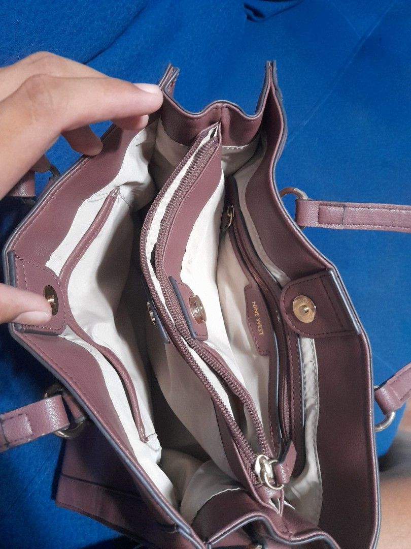 Authentic Nine West bag (Category: Shoulder Bags) located in Manila. Submitted by alamarween (Listing ID 1308272029, Image 3). Description: used a few times can't find the shoulder strap and may minor scratch see photos to inspect. shipping fee will be shouldered by the buyer. thank you po.