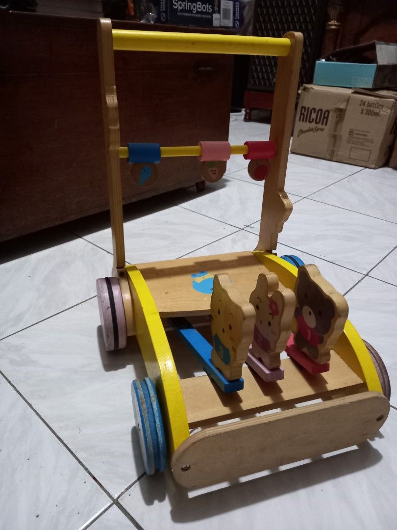 Baby walker toy (Category: Infant Playtime) located in Tagbilaran City. Submitted by m_j_y_m.turtle (Listing ID 1308287571, Image 1). Description: Item still working Figures will move as walker is pushed forward Just need cleaning Height 15.5 inches.