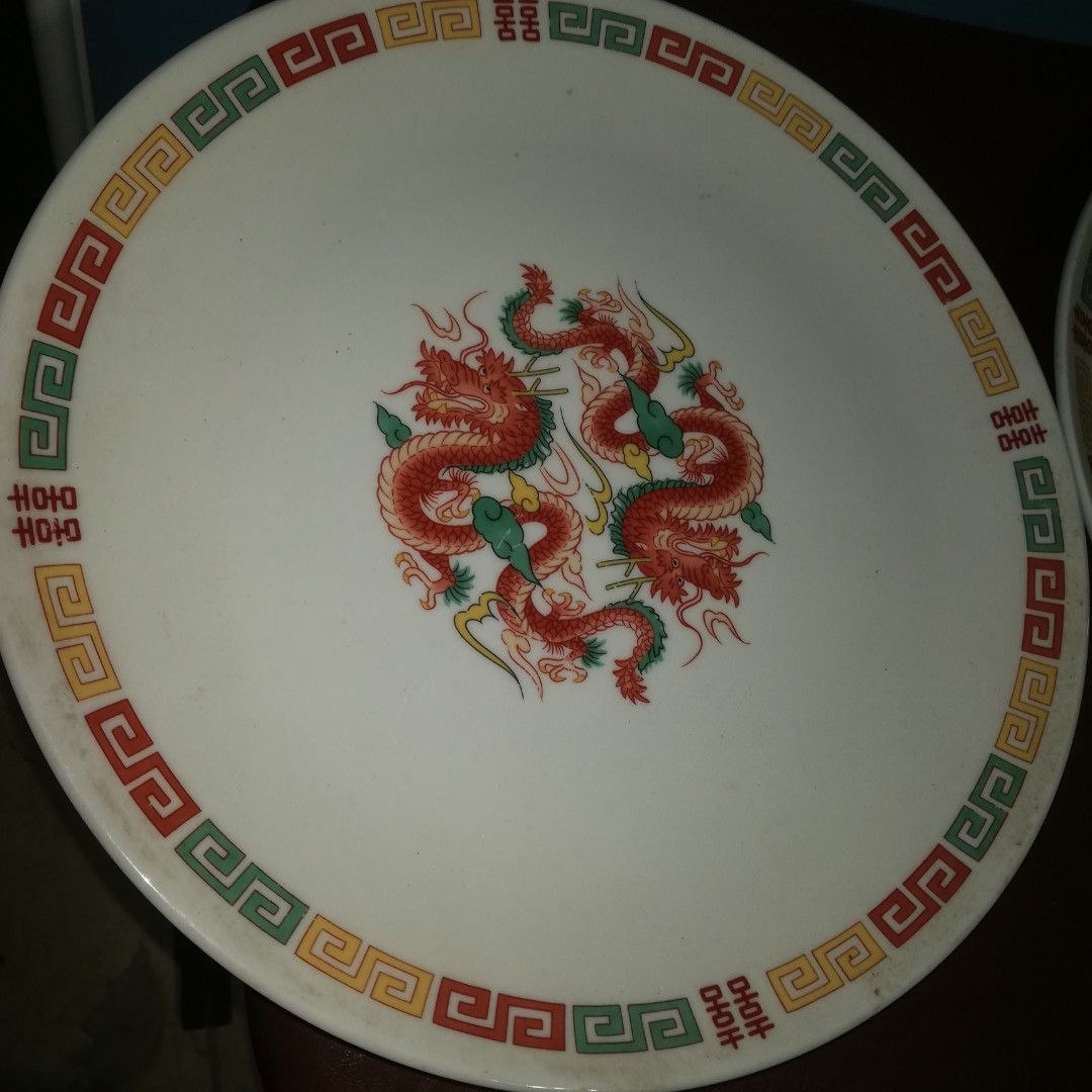 chinese pottery plates (Category: Dinnerware & Cutlery) located in Paranaque City. Submitted by 4thestate.surplusan (Listing ID 1308133421, Image 2). Description: 2pcs dragon design plates, 24cm. take 2 price. no issue.mop gcash. 09175640820.fourth estate paranaque.