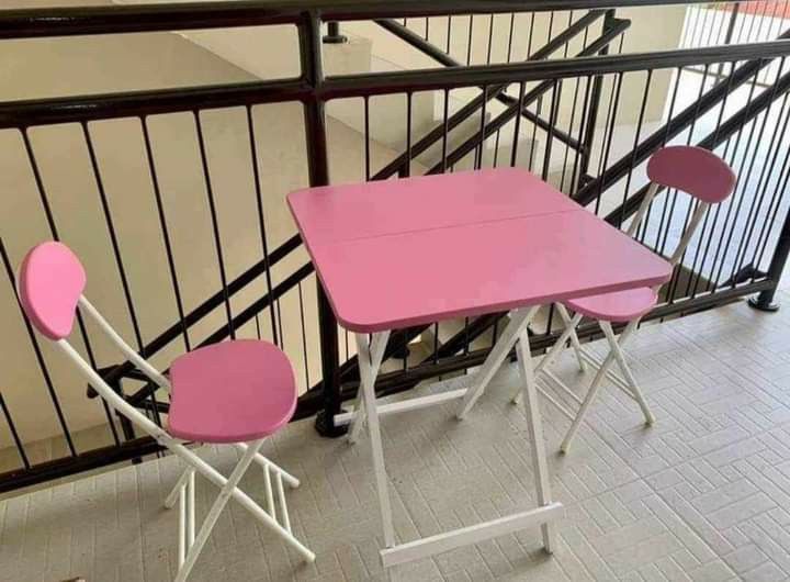 Foldable table en 2 chairs (Category: Tables & Sets) located in Manila. Submitted by saguittarian06 (Listing ID 1308264618, Image 3). Description: FOLDABLE TABLE AND 2 CHAIRS Can be used as breakfast, coffe table or garden table. Available Color: Mahogany, Black & Pink. Table Dimension: 58cm Width x 58cm Length x 70cm Height Inclusion: 1 Table 2 Chairs We do COD / PICK-UP at same day transaction. Open for resellers and bulk orders. Call [hidden i