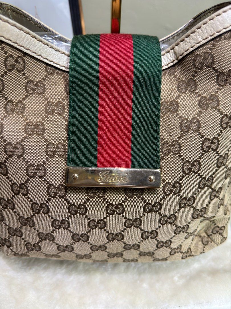 Gucci bag with red trim top