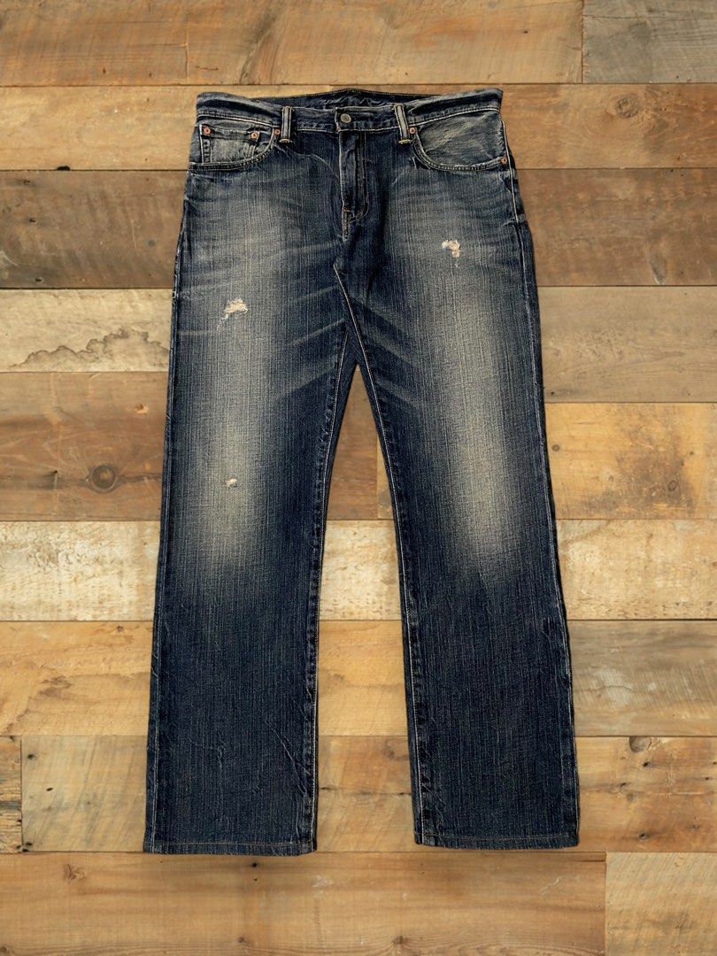 Levi's 502 ripped jeans store