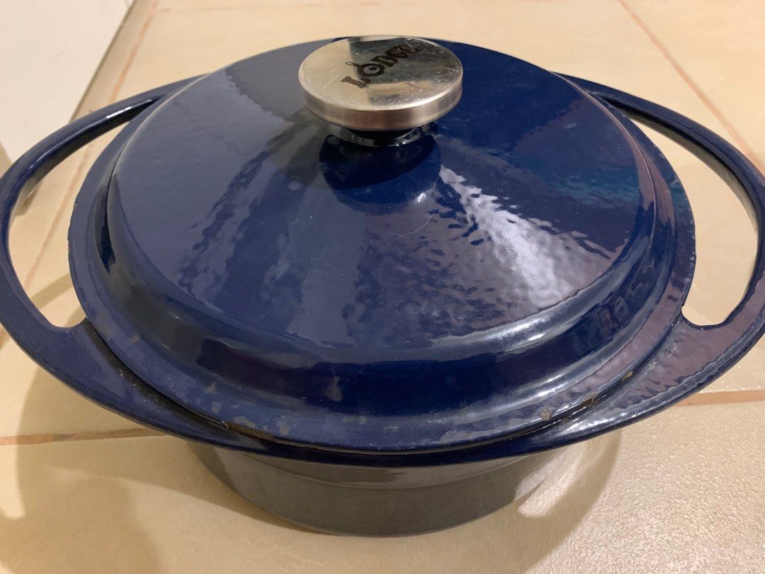 Lodge Enameled Cast Iron Dutch Oven (Category: Cookware & Accessories) located in Quezon City. Submitted by ysabelsonlinethriftstore (Listing ID 1308302202, Image 3). Description: Has paint chips due to usage but does not affect cooking output. Selling it for 4000 only! Pick up at Quezon City near Trinoma.