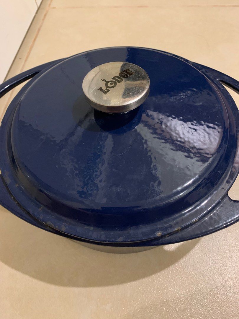 Lodge Enameled Cast Iron Dutch Oven (Category: Cookware & Accessories) located in Quezon City. Submitted by ysabelsonlinethriftstore (Listing ID 1308302202, Image 2). Description: Has paint chips due to usage but does not affect cooking output. Selling it for 4000 only! Pick up at Quezon City near Trinoma.
