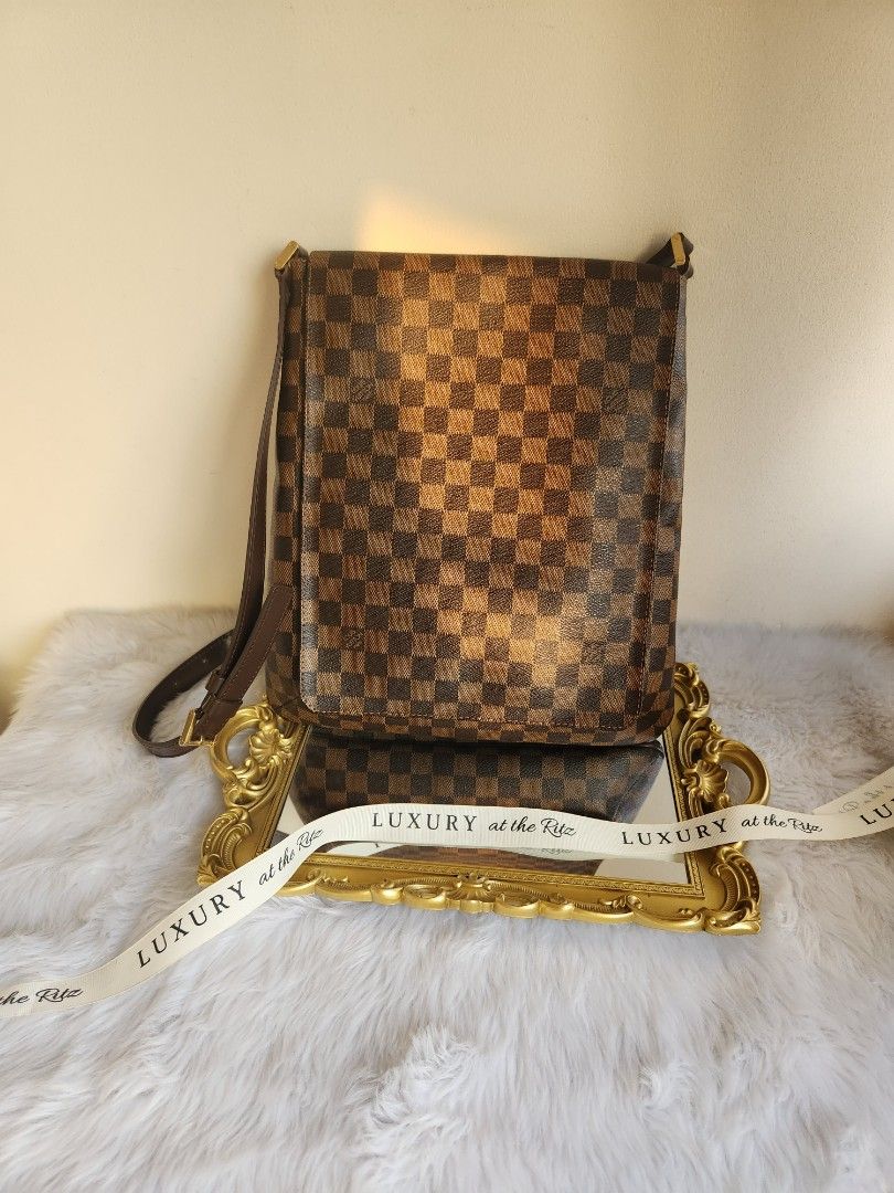Damier ebene sling bag sales