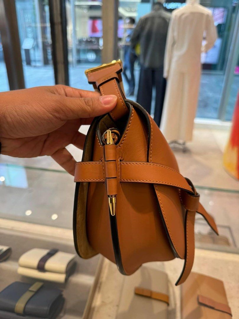 (Pre order) LOEWE Gate Bag SMALL- Tan & Sand colors (Category: Luxury Bags & Wallets) located in Manila. Submitted by issavee (Listing ID 1308242167, Image 3). Description: ₱161,000 CASH ₱172,000 if 50% dp 🔖 AUTHENTHIC 💯% 🛒 Pre-order from Japan ✔️50 % dp and 50% upon arrival ✈️ International free shipping 🚛 PH local shipping C/o costumer ✅ Shipping LBC / Lalamove 📩 Direct message us for any item you need, we will help you! 😍.