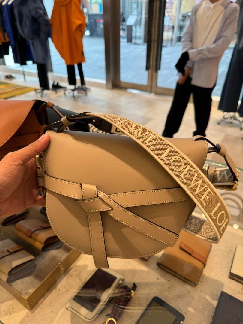 (Pre order) LOEWE Gate Bag SMALL- Tan & Sand colors (Category: Luxury Bags & Wallets) located in Manila. Submitted by issavee (Listing ID 1308242167, Image 2). Description: ₱161,000 CASH ₱172,000 if 50% dp 🔖 AUTHENTHIC 💯% 🛒 Pre-order from Japan ✔️50 % dp and 50% upon arrival ✈️ International free shipping 🚛 PH local shipping C/o costumer ✅ Shipping LBC / Lalamove 📩 Direct message us for any item you need, we will help you! 😍.