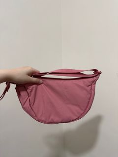 Uniqlo round mini shoulder bag in pink