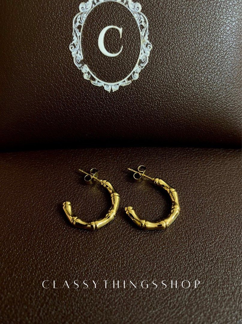 Bamboo Hoop Earrings (Category: Earrings) located in Quezon City. Submitted by classythingsshop (Listing ID 1308478109, Image 2). Description: Bamboo Hoop Earrings. Actual photo of the item. [You may use the photo with the coin for size reference] Material: Stainless steel. All our items are high quality, nontarnish and hypoallergenic. Feel free to inquire anytime through our chat or use the number below as intended. Thank you!.