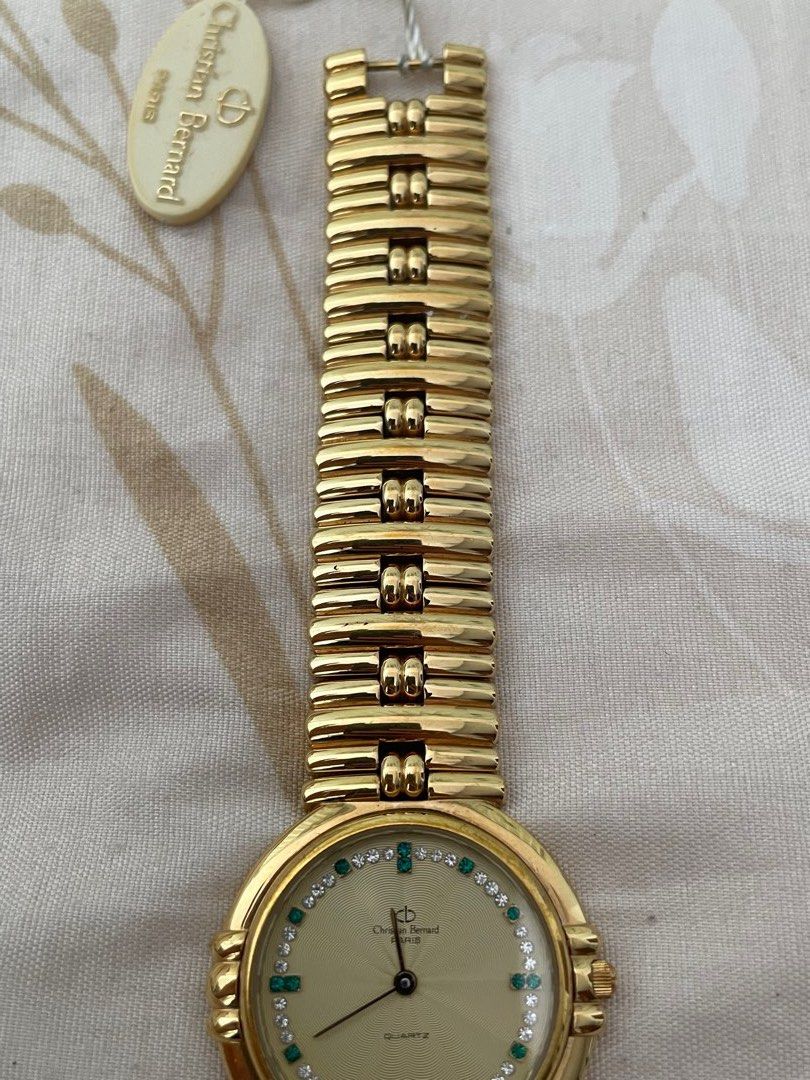 read desc christian bernard 18k gold watch