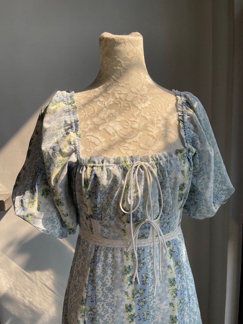 cottagecore blue floral dress (Category: Dresses) located in Quezon City. Submitted by kkaitly (Listing ID 1308423145, Image 2). Description: • DIMENSIONS bust: 30 - 34 inch (can fit cups a - c) waist: 27 - 28 inch length: approx 44 - 45 inch • guaranteed high quality • with inner lining & back zipper • bust ribbons can be adjusted • no haggling unless getting 3 or more items TAGS 🏷️ coquette cottagecore bow midi maci floral flower pattern elega