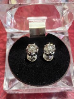 Diamond studd earrings set in 14k white gold