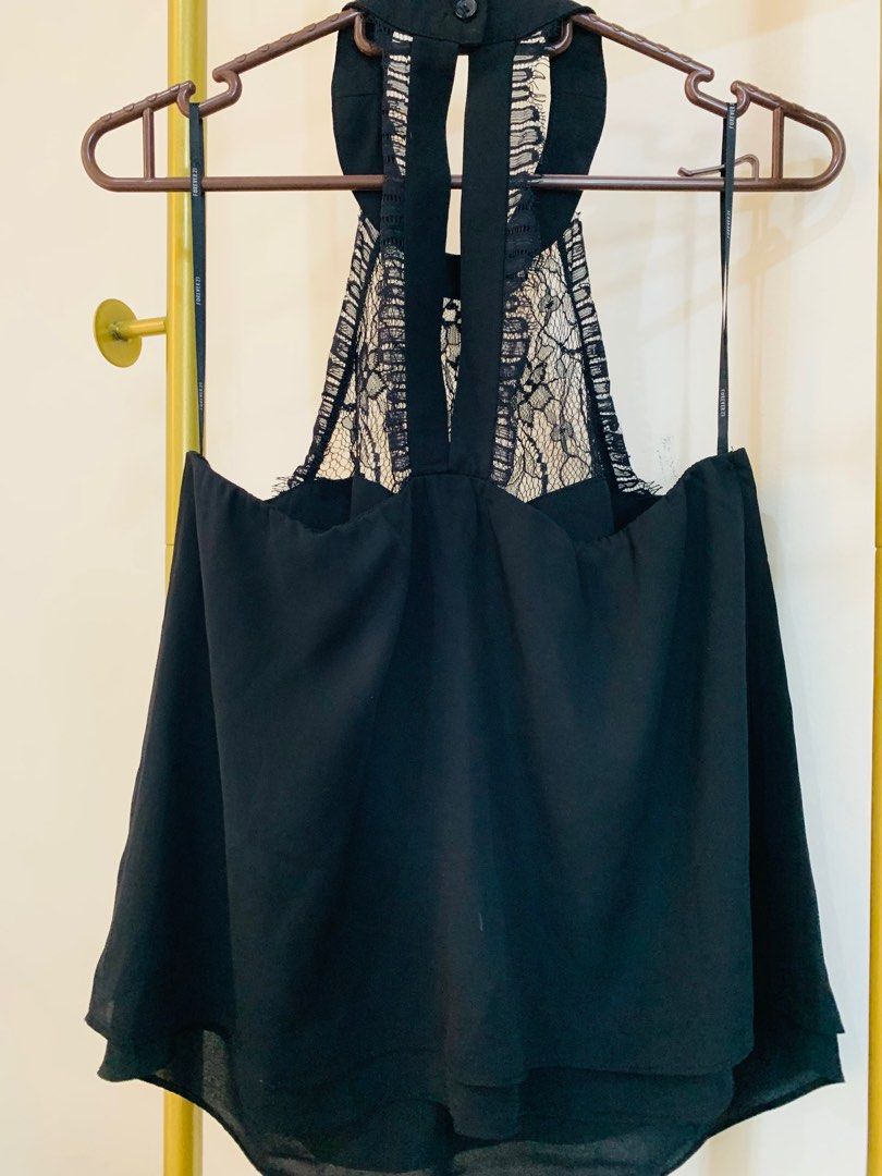 Forever 21 Halter lace top (Category: Sleeveless) located in Quezon City. Submitted by ron_s (Listing ID 1308367667, Image 3). Description: Bawas gamit 💕 Good condition No flaws Fit to S-M No when worn please Reference photo posted*.