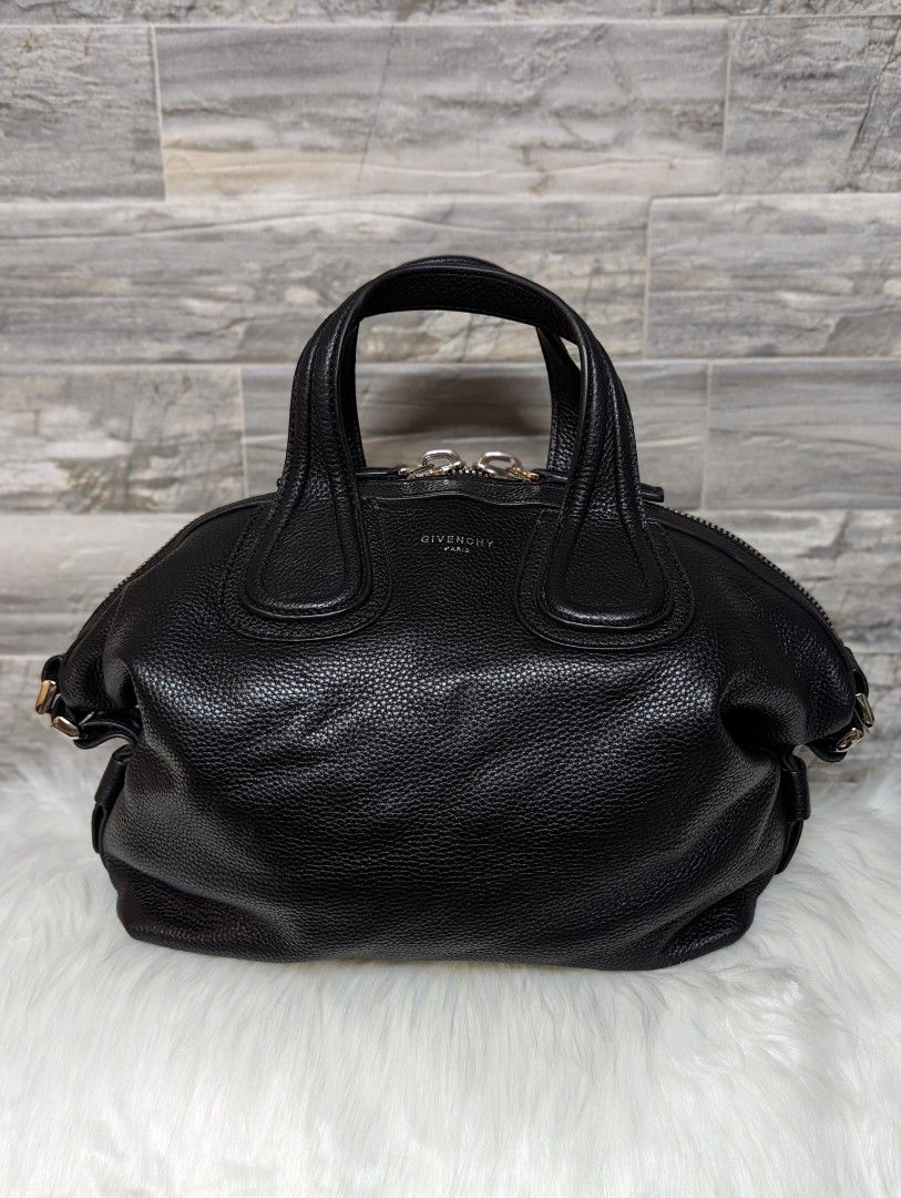 Givenchy Nightingale (Category: Luxury Bags & Wallets) located in Manila. Submitted by facet.ornament (Listing ID 1308435041, Image 1). Description: Givenchy Nightingale Black Small Calfskin bag With detachable sling strap, dustbag, care cards Coded Excellent condition No rubs on the handle and sides of the bag Seldom used Slight crease lower part of brand stamp due to storage.